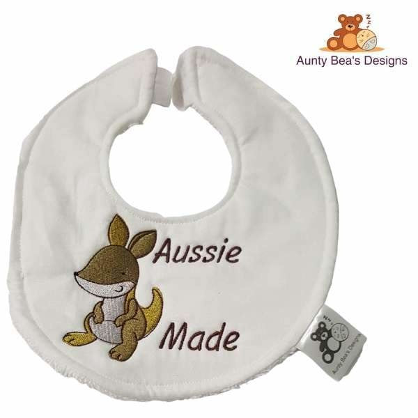 Super cute 100% cotton/towelling bib with embroidered design "Aussie Made" and baby kangaroo.  Handmade in Australia.