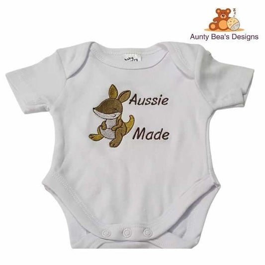 Super cute short sleeve 100% cotton romper with "Aussie Made" Baby Kangaroo design.  Handmade in Australia  Great Gift idea. Please choose size when ordering.